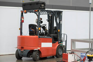 The forklift in the big warehouse.