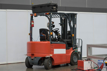 The forklift in the big warehouse.