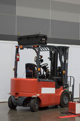 The forklift in the big warehouse.