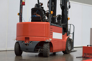 The forklift in the big warehouse.