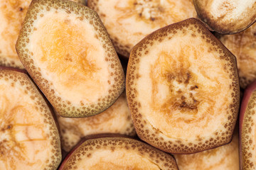 top view of ripe delicious yellow banana slices