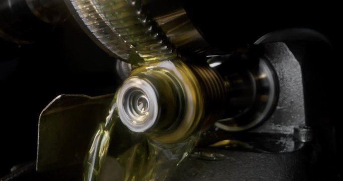 Slow motion macro of specialist is working on production of different gearing details in a workshop in industrial factory.