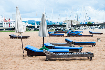 Fototapeta na wymiar Beach chairs in South Beach Thailand stock photo