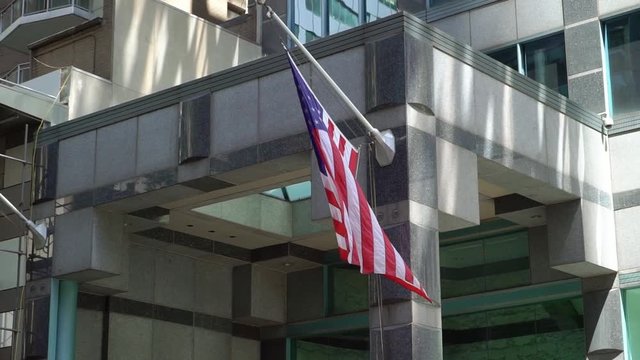 USA flag at building in a city