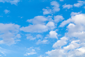 Naklejka na ściany i meble Blue sky background with clouds.selective focus.