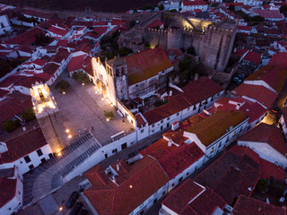 Night aerial view of Sepra with Castle and clock tower