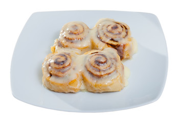 Obraz na płótnie Canvas Vegan cinnabon rolls with topping