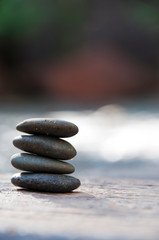 Zen stone on beach for perfect meditation, stack of pebble stones on balance on sand, Pebbles and sand stone composition, Zen stones garden, pile of balanced stone