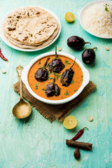 Baingan masala / Eggplant / brinjal curry served with chapati and rice, selective focus