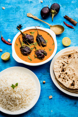 Baingan masala / Eggplant / brinjal curry served with chapati and rice, selective focus