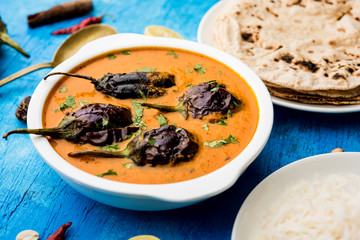Baingan masala / Eggplant / brinjal curry served with chapati and rice, selective focus