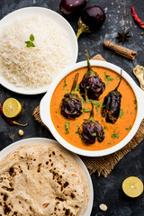 Baingan masala / Eggplant / brinjal curry served with chapati and rice, selective focus