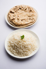 Chapati / Roti with Cooked plain rice, selective focus