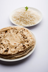 Chapati / Roti with Cooked plain rice, selective focus