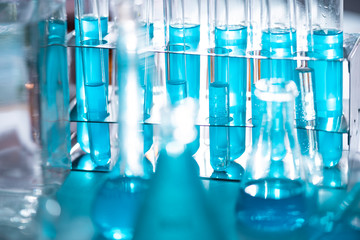 Chemical laboratory equipment Glassware for research and blue matter