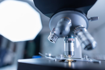 The scientist test the natural product extract, oil and biofuel solution, in the chemistry laboratory.
