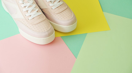 Stylish  shoes on pastel color background.