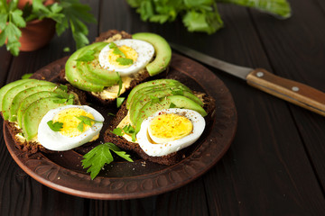 avocado. sandwich with avocado and egg. breakfast. healthy food.