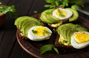 avocado. sandwich with avocado and egg. breakfast. healthy food.