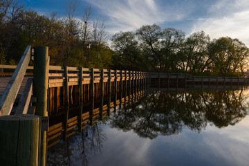 reflection of boardwalk on the lake