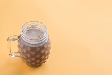 Chocolate smoothie  on fluor color background