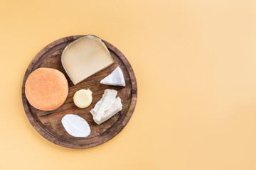 assortment of quality cheese in background