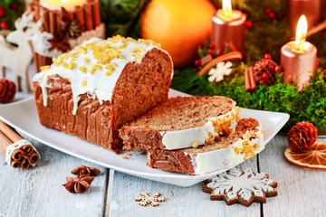 Christmas gingerbread cake among traditional decorations.
