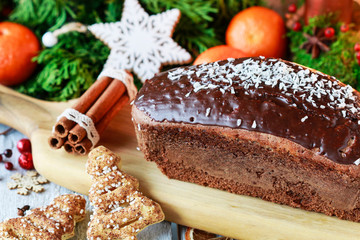 Christmas gingerbread cake among traditional decorations.