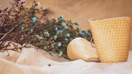 Set of Empty wicker basket on the table with background in natural linen and green plant,Template mock up for display of product