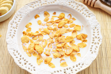 Healthy breakfast: corn flakes with milk.