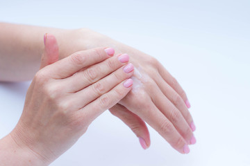 beautiful soft hands of a woman and handcream skincare