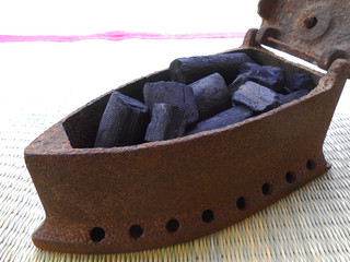 brown leather belt with metal buckle