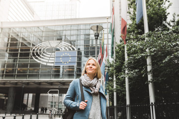 Fototapeta na wymiar Female tourist sightseeing in Brussels, Belgium. European Parliament Building