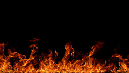 Fototapeta na wymiar Fire flames on black background.