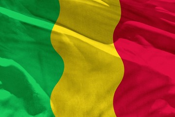 Waving Mali flag for using as texture or background, the flag is fluttering on the wind