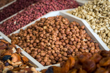 Obraz na płótnie Canvas hazelnuts on the store shelves. different varieties of nuts.