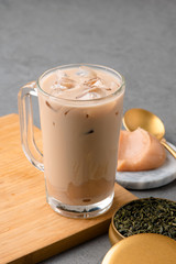 Hong Kong style milk tea with ice in a clean glass