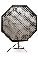 equipment flash with honeycombs with octagonal softbox on the rack in studio close-up on a white background