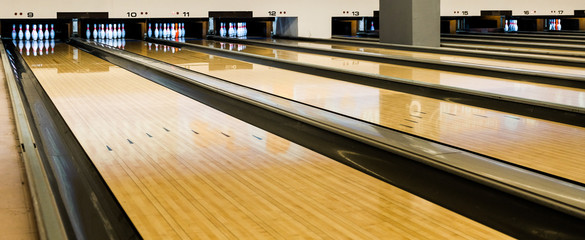 Bowling wooden floor with lane, Generic Bowling Alley lanes with bowling ball going towards the...