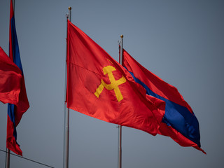 Loas and communists flags in Vientiane