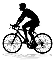 Fototapeta premium Rowerzysta jedzie na rowerze rowerzysta w sylwetce