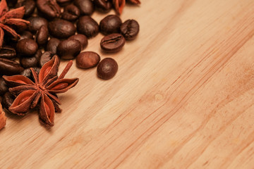Brown background, With coffee and spices, Lay on the wooden floor.