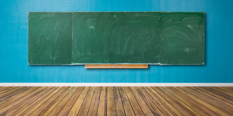 Blank green chalkboard, blackboard texture with copy space hangs on blue grunge wall and wooden floor 3D-Illustration
