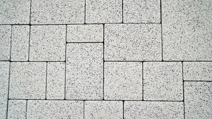 Natural stone wall texture. Rustic colorful surface floor pavement background. Texture tile