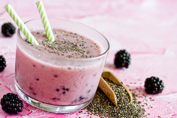 Chia pudding with fresh blackberry in glass, healthy food idea