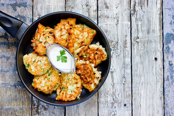 Pan fried zucchini pancakes stuffed with meat