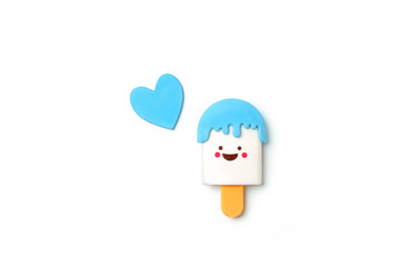kawaii ice cream toy and heart on white background. cute cartoon character, symbol of childhood, summer, vacation. top view, copy space. 