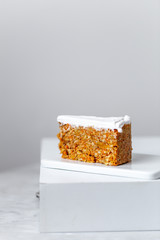 Healthy Homemade Carrot Cake on marble background with copy space