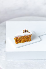 Healthy Homemade Carrot Cake on marble background with copy space