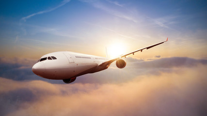 Passengers commercial airplane flying above clouds